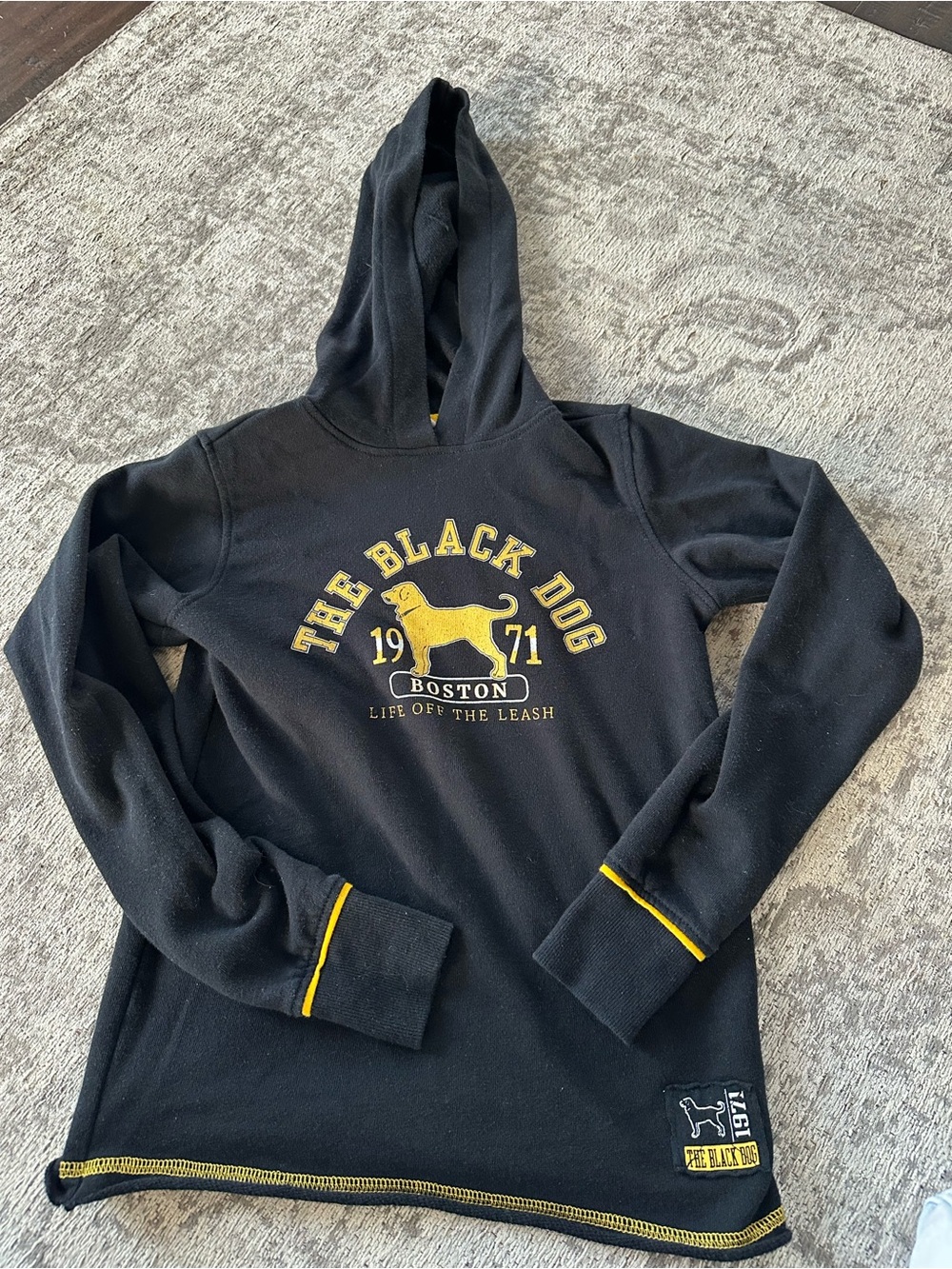 The Black Dog Black Hoodie with Yellow Logo and Trim